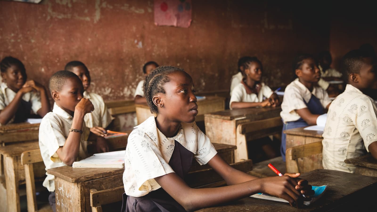 Pupils sitting in a classroom in Lagos, Nigeria — Photo by Doug Linstedt on Unsplash